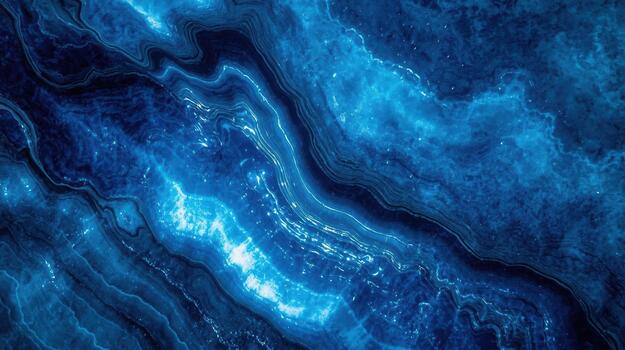 An abstract blue agate pattern features swirling lines and crystalline formations resembling flowing rivers with a textured and dynamic appearance. photo