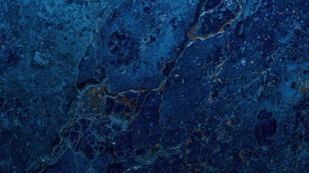 Detailed closeup of abstract dark blue marble texture with golden veins, creating an elegant and sophisticated natural stone background art. photo