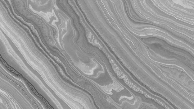 The abstract gray and white background features flowing curves and lines creating a tranquil and calming marble texture for various designs. photo