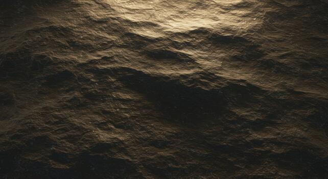 The golden abstract background showcases dark ridges and shiny highlights with its metallic textures creating a dramatic, luxurious effect. photo