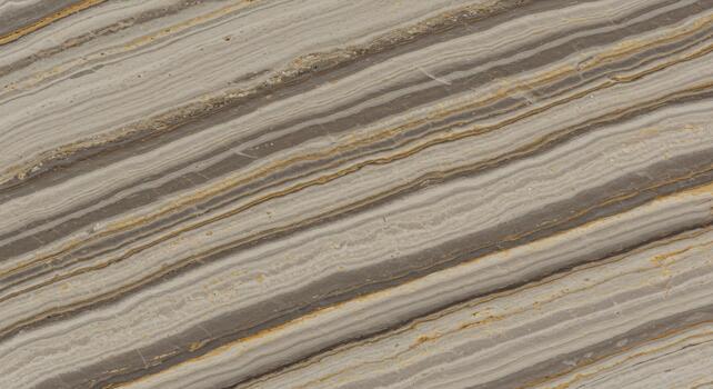 Natural stone background displays diagonal bands of tan, gray and white creating a layered sedimentary rock effect for decorative applications. photo