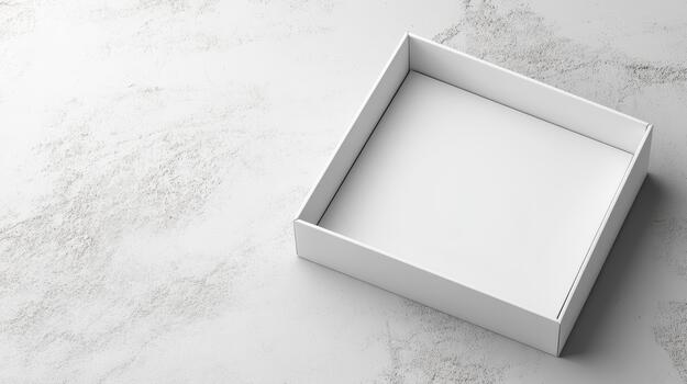 An empty white box sitting on a table photo
