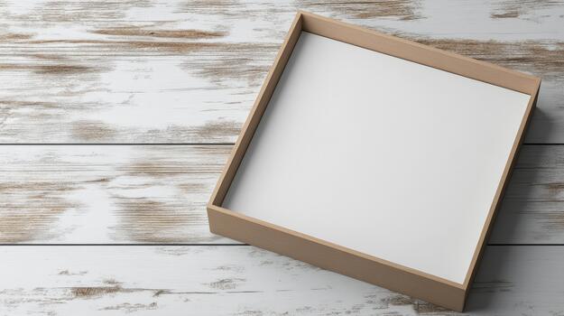 Empty cardboard box on wooden table photo