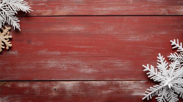 Christmas background with snowflakes on red wooden background photo
