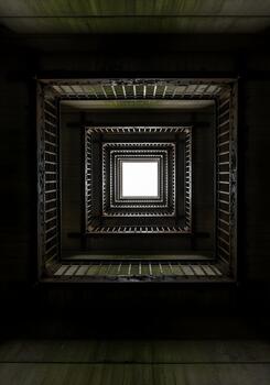 Abstract View of a Dark Stairwell Ascending with Repetitive Geometric Square Frames and a Glimmer of Light at the Top Creating a Sense of Depth photo