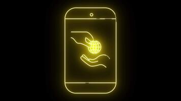 Glowing yellow outline of a smartphone displaying hands passing a gridpattern globe Black background video