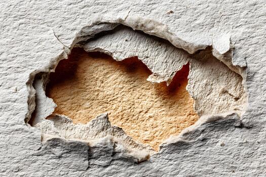 Torn Paper Texture with Exposed Layer Showing Contrast for Creative Design photo
