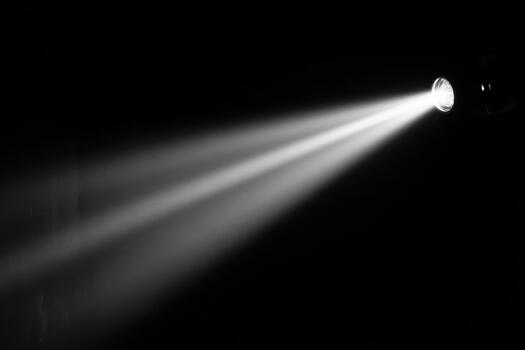 Light beam shines in a dark space photo