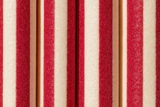 Colorful striped texture in vibrant red and cream photo