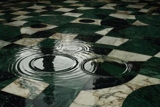 Ripples on a patterned marble floor after rain photo