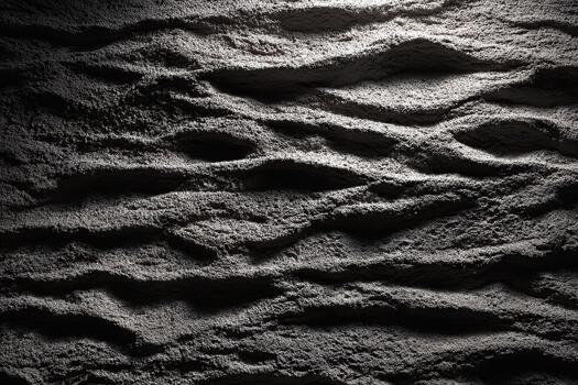 Textured surface showing patterns in rock formation photo