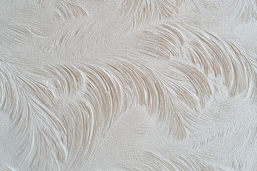 Textured wall with swirled patterns creates depth photo