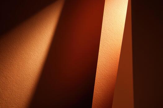 Shadows and light create depth in warm orange walls photo