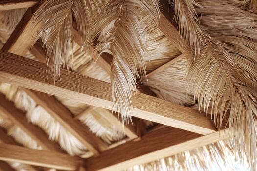 Natural roof design with palm leaves in warm location photo