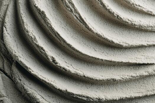 Textured surface of smooth gray material in layered patterns photo