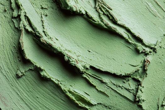 Texture of smooth green paint on canvas surface photo