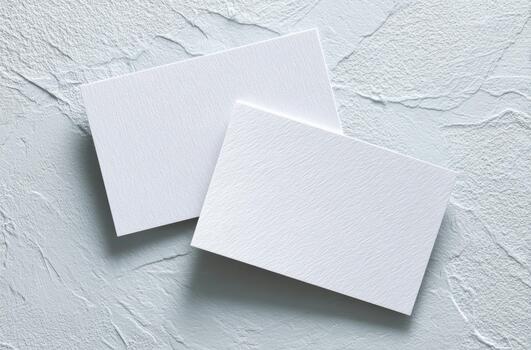 Blank business cards on textured background ready for use photo