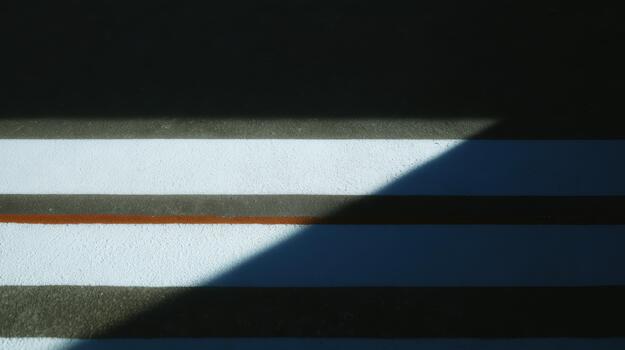 Creative shadows and stripes on a concrete surface photo