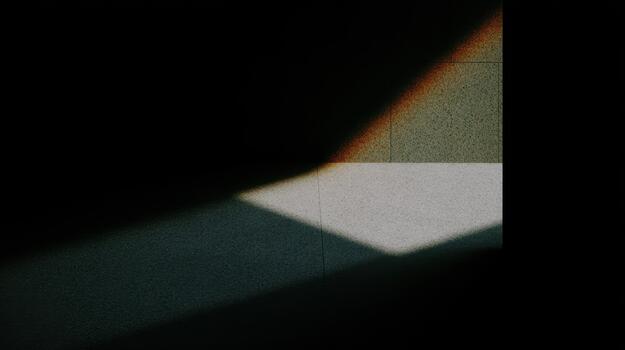 Light and shadow create an abstract pattern on the floor photo