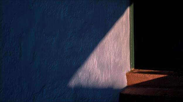 Light and shadow play on a door at sunset photo