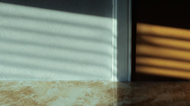 Shadows on the floor from sunlight and blinds photo