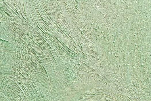 Textured green wall with subtle patterns photo