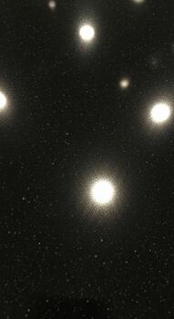 Abstract dark background with glowing circular lights creating a celestial or starry night effect with soft focus photo