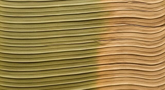 Close up abstract view of layered textured paper or fabric with subtle color gradient and shadow photo
