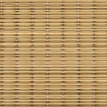 Close up view of a woven natural straw mat with a repeating horizontal and vertical striped pattern photo