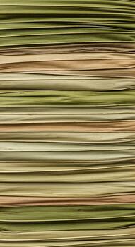 Abstract horizontal lines of green and tan create a textured background pattern of natural fibers photo