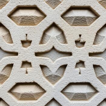 Intricate geometric lattice pattern carved into aged stone with subtle shadows and highlights creating depth and texture photo