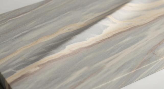 Abstract close up of flowing textured fabric with subtle color variations and diagonal lines creating a sense of movement photo