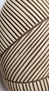 Close up abstract view of a textured surface with repeating diagonal dark brown stripes on a light beige background photo