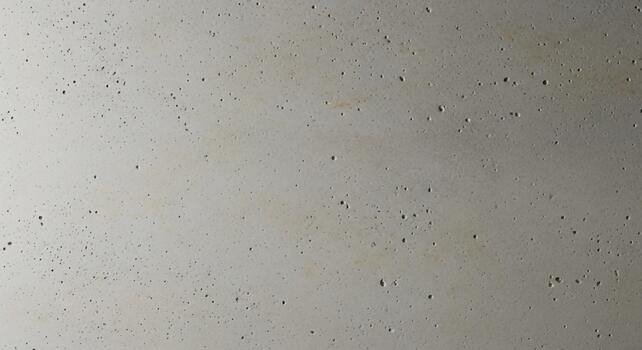 sutil textura de ligero gris superficie con minúsculo motas y un amable degradado transición foto