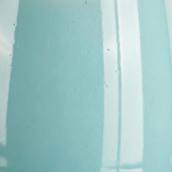Abstract close up of soft teal and white vertical stripes creating a calm and modern background texture photo