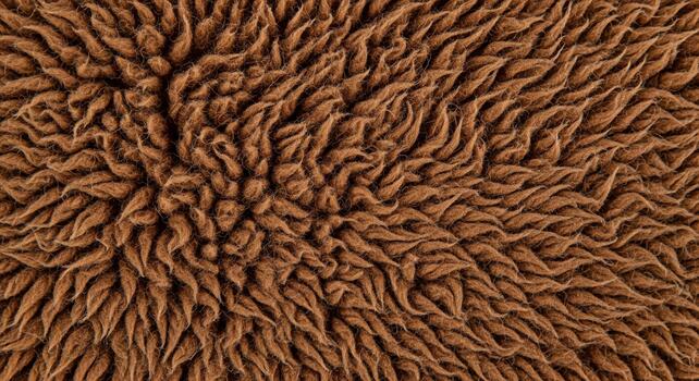 Close up macro view of a textured brown fuzzy material creating a warm and inviting abstract pattern photo