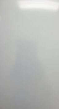 A close up abstract view of a textured surface with subtle lighting and a hint of a grid pattern photo