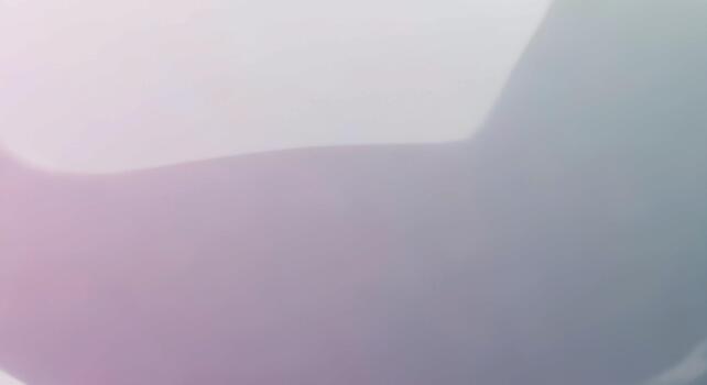 Abstract soft gradient background with a subtle blend of pastel pink lavender and muted blue tones creating a dreamy atmosphere photo