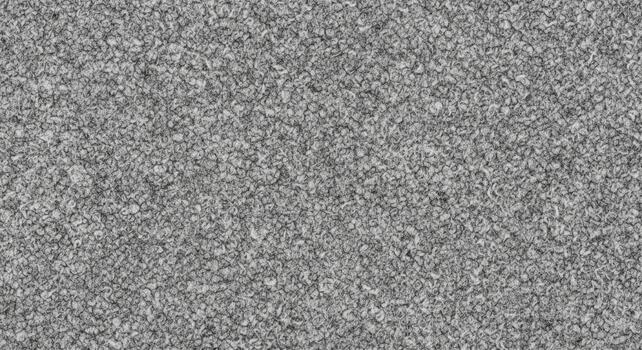 Abstract textured gray background with subtle variations in tone and pattern creating a visually engaging surface photo