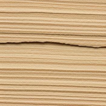 Close up view of light colored wood grain with subtle variations and a horizontal crack running through the center photo
