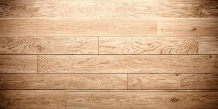 A close up view of light brown wooden floor planks with natural grain patterns creating a warm texture background photo