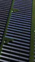 Vast solar panel array capturing sunlight to provide renewable energy in a sunny landscape, showcasing innovation in clean technology and sustainable practices video