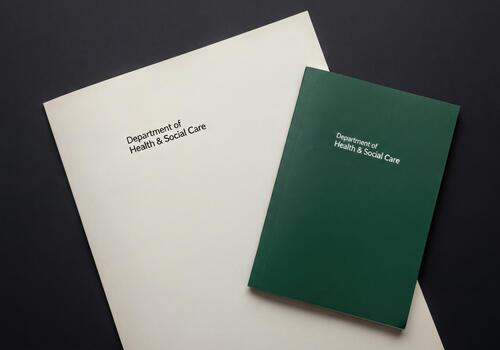 Professional health and social care documents displaying a formal crest emblem and date photo