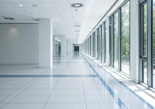 Long Bright Modern Empty Corridor of Contemporary Office Building with Large Windows photo