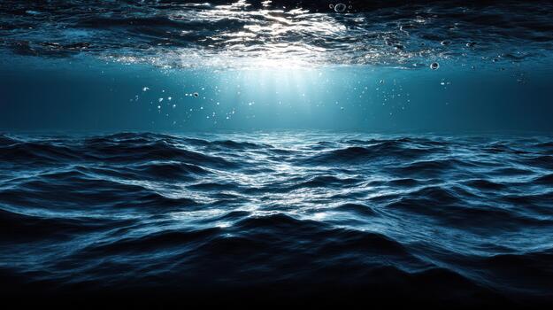 Underwater scene ocean waves with sunlight beaming through the surface photo