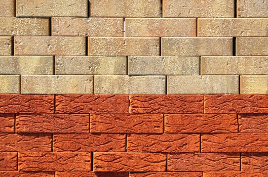 The texture of the brick wall of different colors for construction. Facing building material photo