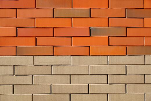 The texture of brick wall of different colors for construction. Facing building material. Construction background photo