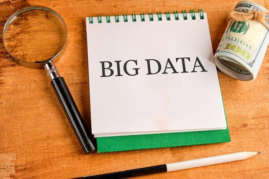 The concept of technology and development. Phrase, words, text BIG DATA in a notebook on an old background, top view photo