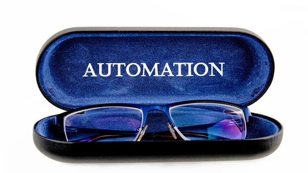 The concept of technology and development. Phrase, words, text AUTOMATION written on the open case of the glasses case photo