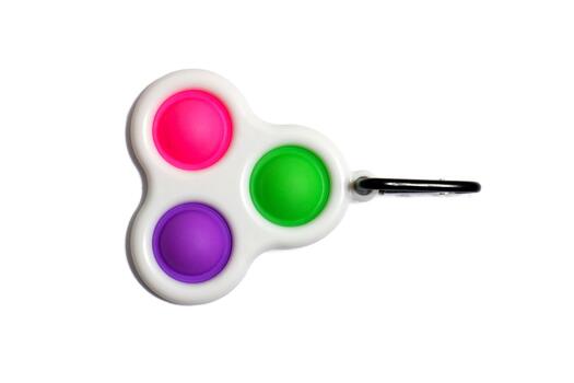 Simple Dimple sensory fidget toy with three colorful buttons on a white background photo